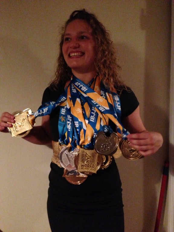 Showing off all of her medals from 2013 alone.